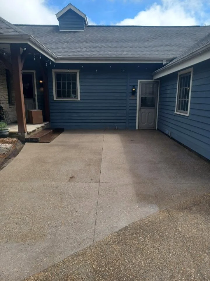 Exposed Aggregate Patio Newly installed exposed aggregate concrete patio for a home.